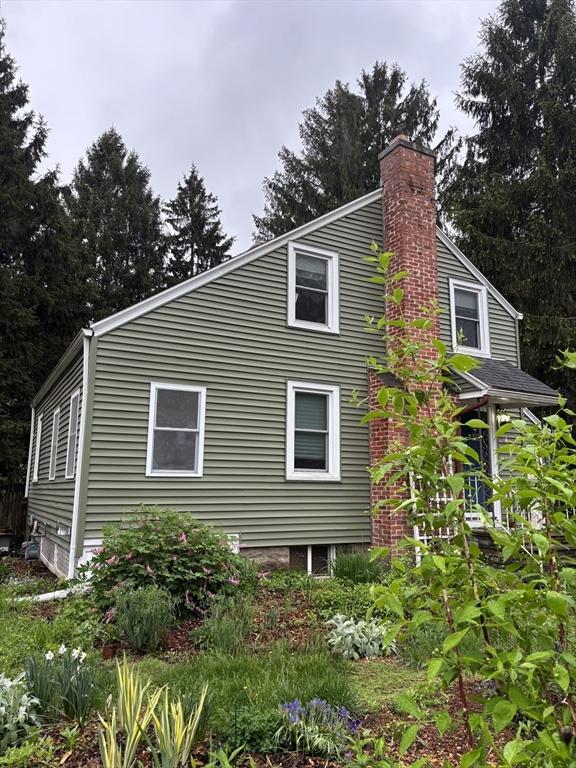 14 Anderson Ave, Holyoke, MA 01040 - view of side of home featuring a chimney
