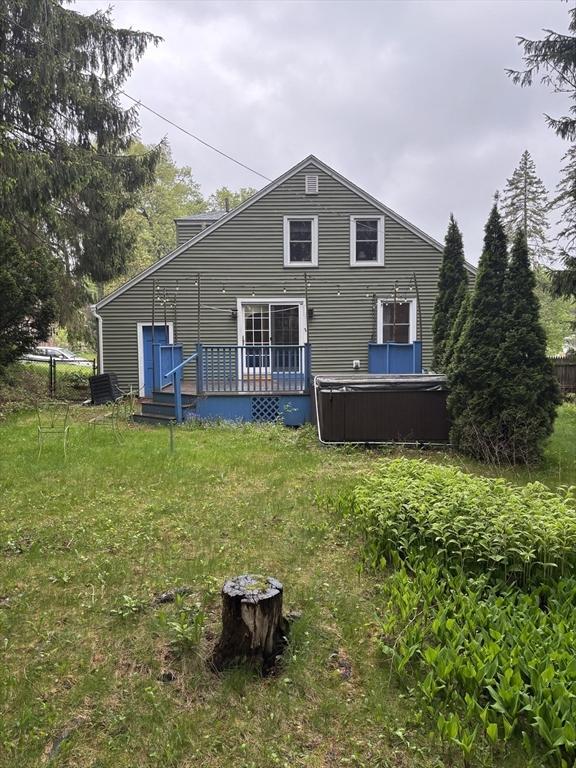 14 Anderson Ave, Holyoke, MA 01040 - back of house with a wooden deck and a hot tub