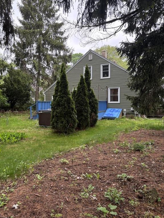 14 Anderson Ave, Holyoke, MA 01040 - view of side of property with a chimney