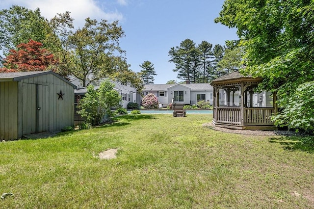 18 Patriot Rd, Tewksbury, MA 01876 - view of green lawn featuring a gazebo and a swimming pool