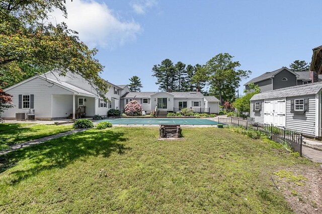 18 Patriot Rd, Tewksbury, MA 01876 - view of yard with central air condition unit and a residential view