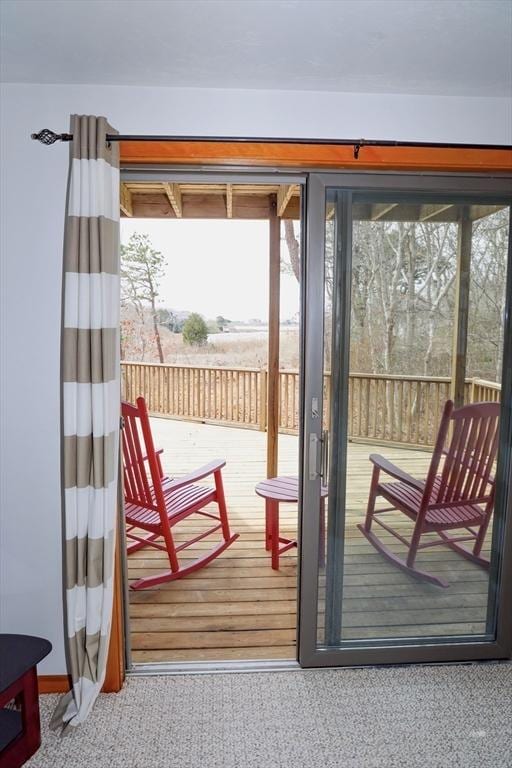 15 Beach St, Falmouth, MA 02536 - doorway to outside featuring carpet floors and plenty of natural light
