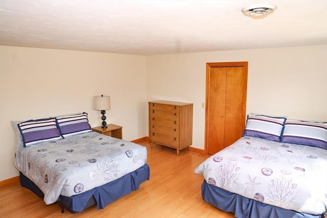 15 Beach St, Falmouth, MA 02536 - bedroom featuring wood finished floors and baseboards