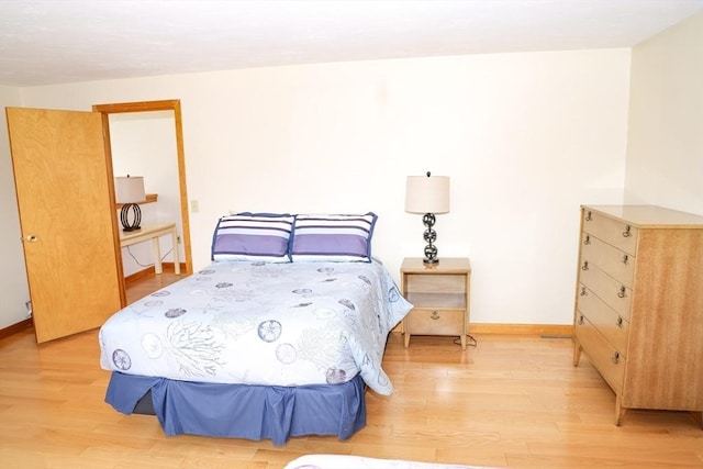 15 Beach St, Falmouth, MA 02536 - bedroom featuring light wood-type flooring and baseboards