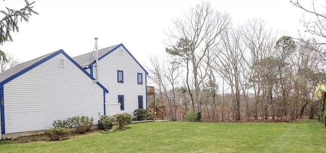 15 Beach St, Falmouth, MA 02536 - view of side of home with a yard