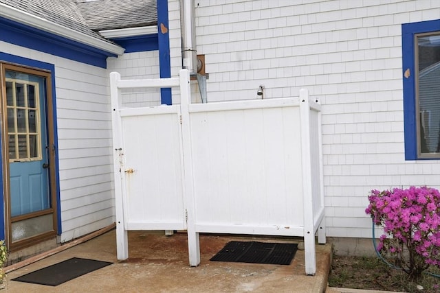 15 Beach St, Falmouth, MA 02536 - property entrance with a shingled roof