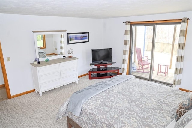 15 Beach St, Falmouth, MA 02536 - bedroom with access to exterior, baseboards, and light colored carpet