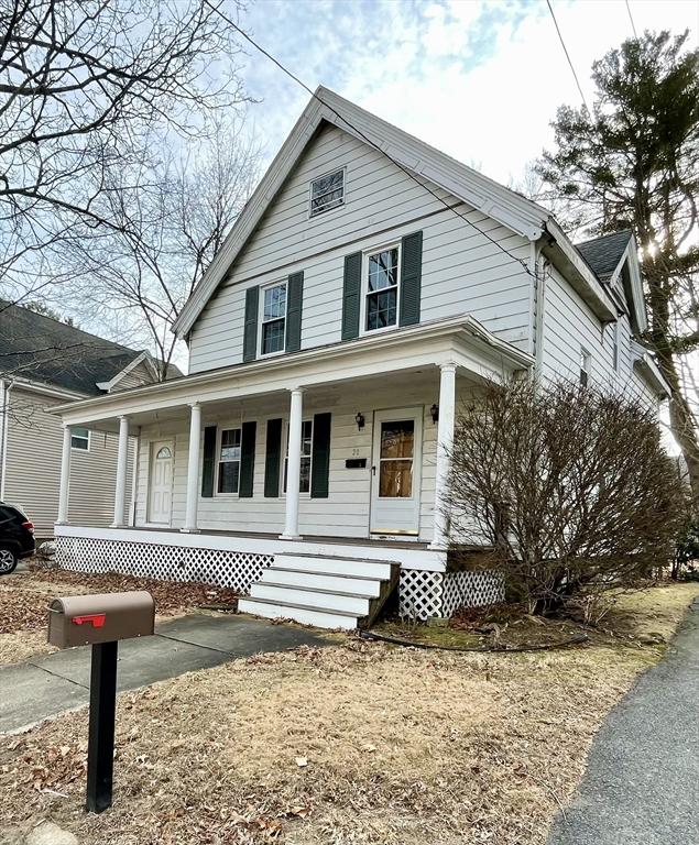 view of front of property featuring covered porch