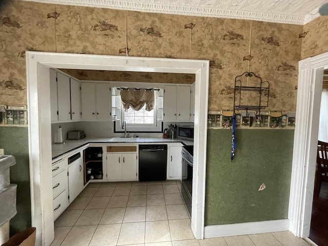 kitchen with stainless steel microwave, electric range, a sink, dishwasher, and wallpapered walls