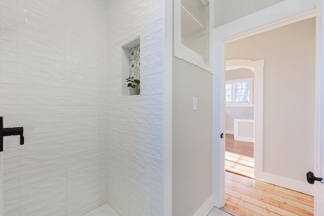 bathroom with wood-type flooring