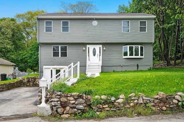 45 Dillon St, Worcester, MA 01604 - colonial house featuring entry steps and a front lawn
