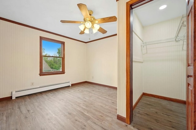 45 Dillon St, Worcester, MA 01604 - empty room with a baseboard radiator, wood finished floors, baseboards, crown molding, and ceiling fan