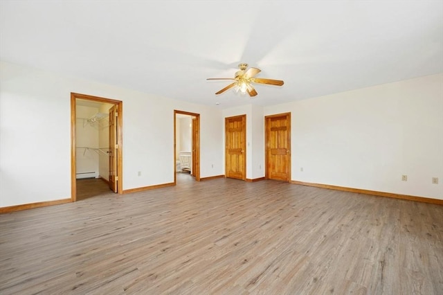 45 Dillon St, Worcester, MA 01604 - empty room featuring light wood-style floors, a baseboard radiator, ceiling fan, and baseboards