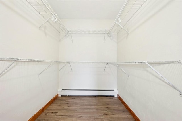 45 Dillon St, Worcester, MA 01604 - walk in closet with a baseboard radiator and wood finished floors