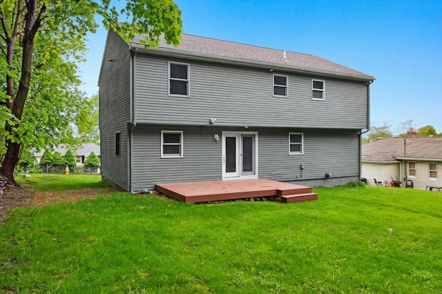 45 Dillon St, Worcester, MA 01604 - back of property featuring a wooden deck and a lawn