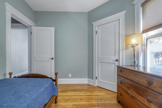 bedroom with light hardwood / wood-style flooring