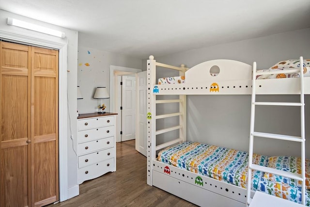 bedroom featuring wood finished floors