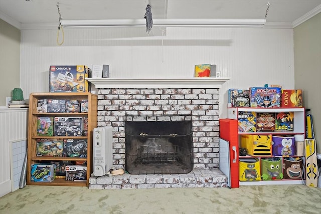 detailed view of crown molding, carpet floors, and a brick fireplace