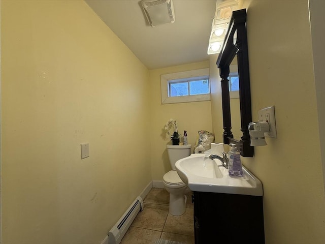 half bath with visible vents, toilet, a baseboard radiator, tile patterned floors, and vanity