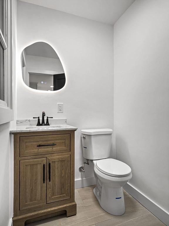 820 N King St, Northampton, MA 01060 - bathroom with vanity and wood finished floors