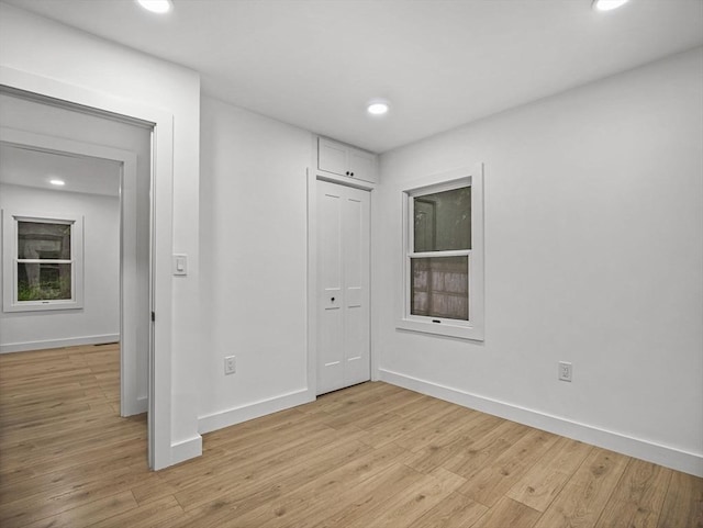 820 N King St, Northampton, MA 01060 - unfurnished bedroom featuring light wood-type flooring, recessed lighting, and a closet