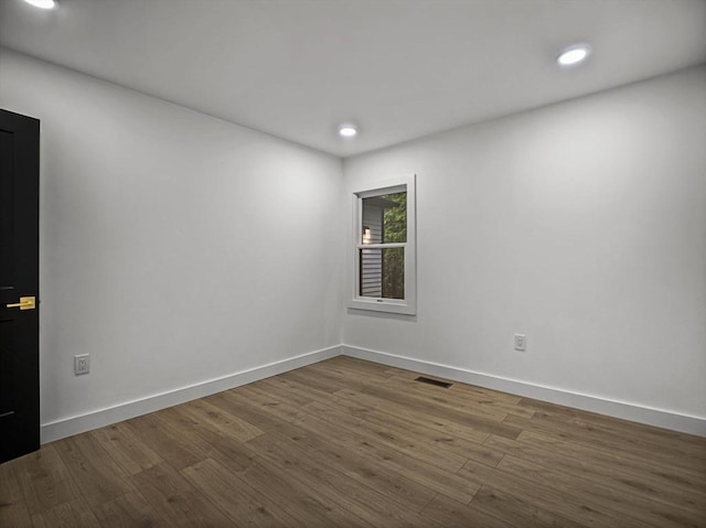 820 N King St, Northampton, MA 01060 - unfurnished room with dark wood-type flooring and recessed lighting