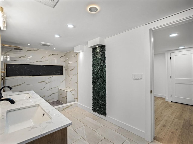 820 N King St, Northampton, MA 01060 - bathroom featuring double vanity, a marble finish shower, and recessed lighting