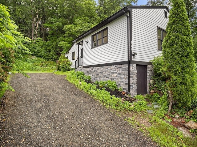 820 N King St, Northampton, MA 01060 - view of side of home with stone siding