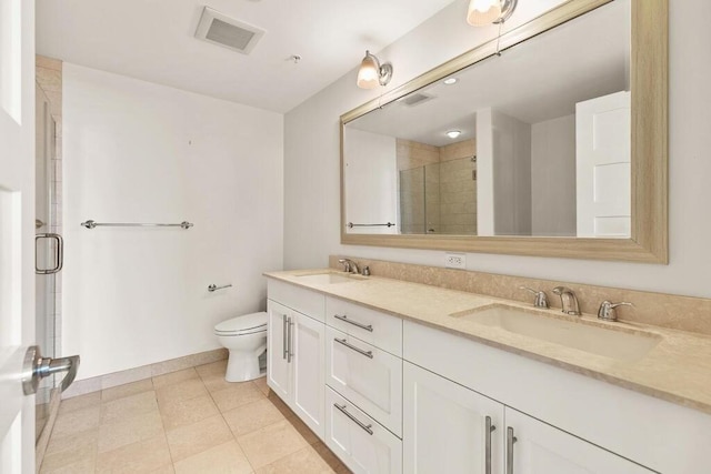 10 Nouvelle Way Unit S703, Natick, MA 01760 - bathroom featuring toilet, a stall shower, double vanity, baseboards, and tile patterned flooring