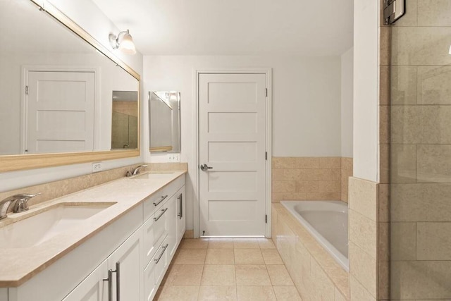 10 Nouvelle Way Unit S703, Natick, MA 01760 - bathroom featuring a garden tub, tile patterned floors, and double vanity