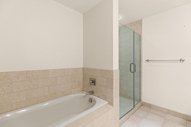 10 Nouvelle Way Unit S703, Natick, MA 01760 - bathroom featuring a stall shower, a bath, tile patterned flooring, and baseboards