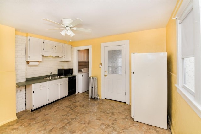 kitchen with radiator, sink, white cabinetry, black appliances, and decorative backsplash