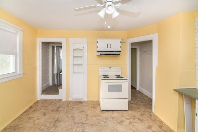 kitchen with white cabinetry, electric range, and ceiling fan