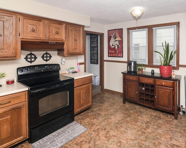 kitchen featuring black range with electric cooktop