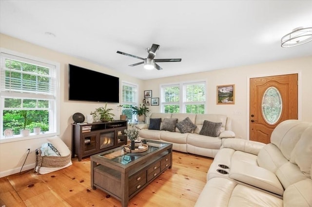 1085 Southbridge Rd, Warren, MA 01585 - living room featuring ceiling fan and light wood-type flooring