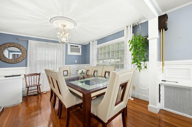 50 Depot St, Milford, MA 01757 - dining room featuring a wall mounted air conditioner, wood finished floors, a chandelier, radiator, and a wainscoted wall
