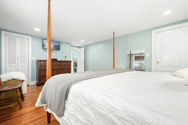 50 Depot St, Milford, MA 01757 - bedroom with wood finished floors, recessed lighting, and baseboards