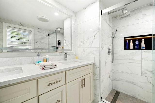 50 Depot St, Milford, MA 01757 - full bathroom with a marble finish shower, double vanity, and tile walls