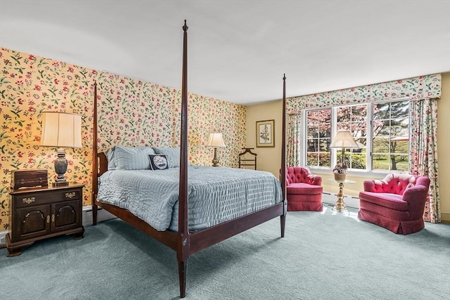 bedroom with wallpapered walls, carpet, a baseboard radiator, and baseboards