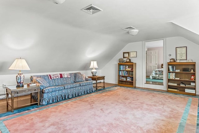 living room featuring lofted ceiling