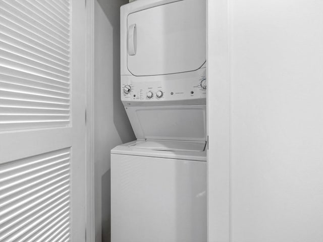150 Cambridge St Unit 403, Cambridge, MA 02141 - laundry area featuring stacked washing machine and dryer