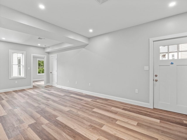 entrance foyer with light hardwood / wood-style flooring