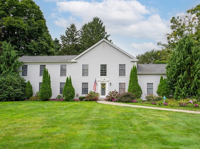 view of front of house with a front lawn