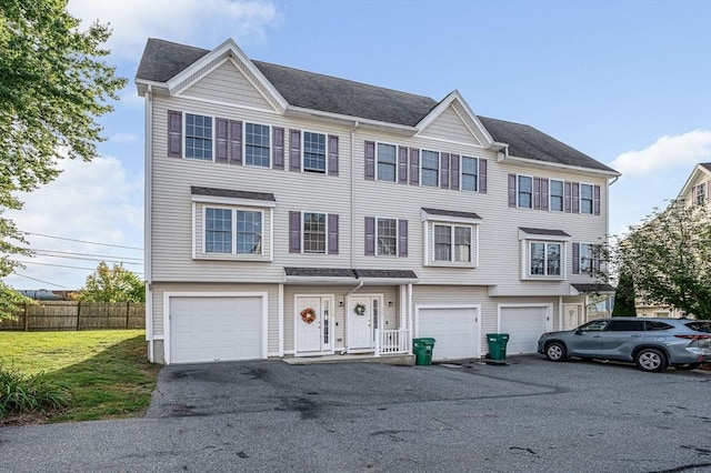 15 Alton St Unit 16, Lowell, MA 01852 - multi unit property featuring a garage and driveway