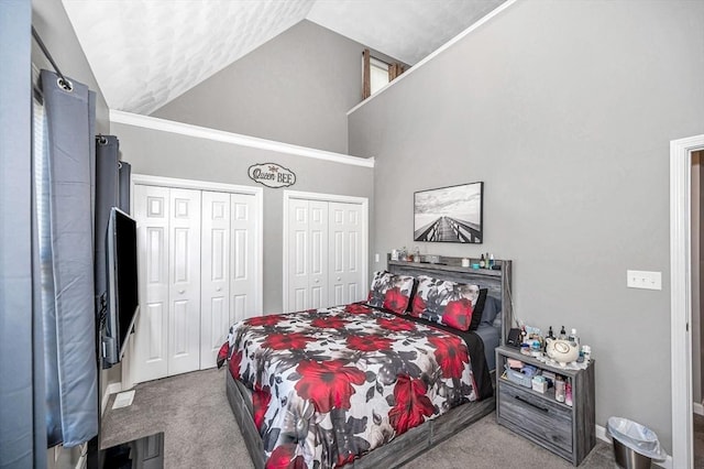 15 Alton St Unit 16, Lowell, MA 01852 - carpeted bedroom with two closets and high vaulted ceiling