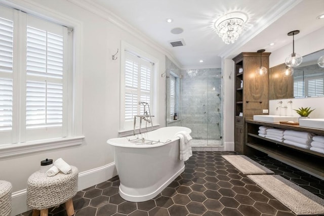 bathroom featuring crown molding, vanity, independent shower and bath, and a notable chandelier