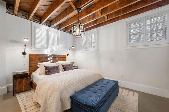 bedroom with wooden ceiling and beamed ceiling