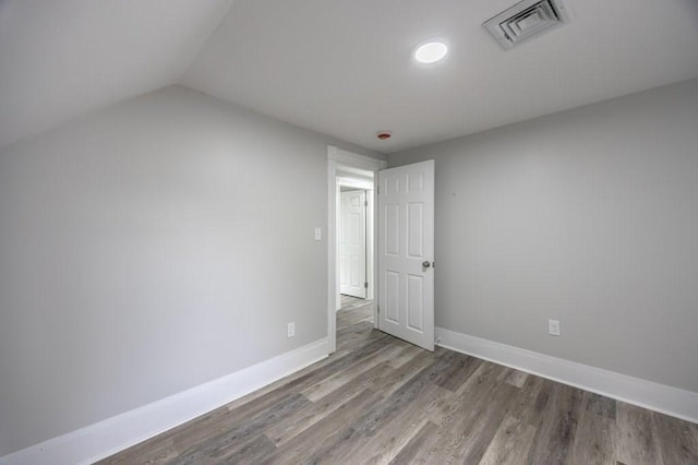 338-340 Main St, Fairhaven, MA 02719 - unfurnished room with wood finished floors and vaulted ceiling