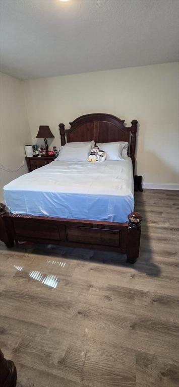 4 Walker Rd Unit 2, North Andover, MA 01845 - bedroom featuring baseboards and wood finished floors