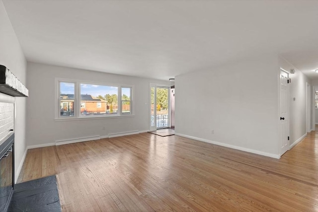 unfurnished living room featuring light wood-type flooring